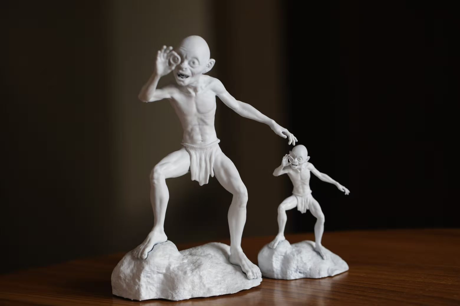 3d printed Gollum in two scales, the big one is around 20 cm, the small one 10 cm. Good job in printing!!!💯💯 💓Source from Chaitanya Siddeshwar