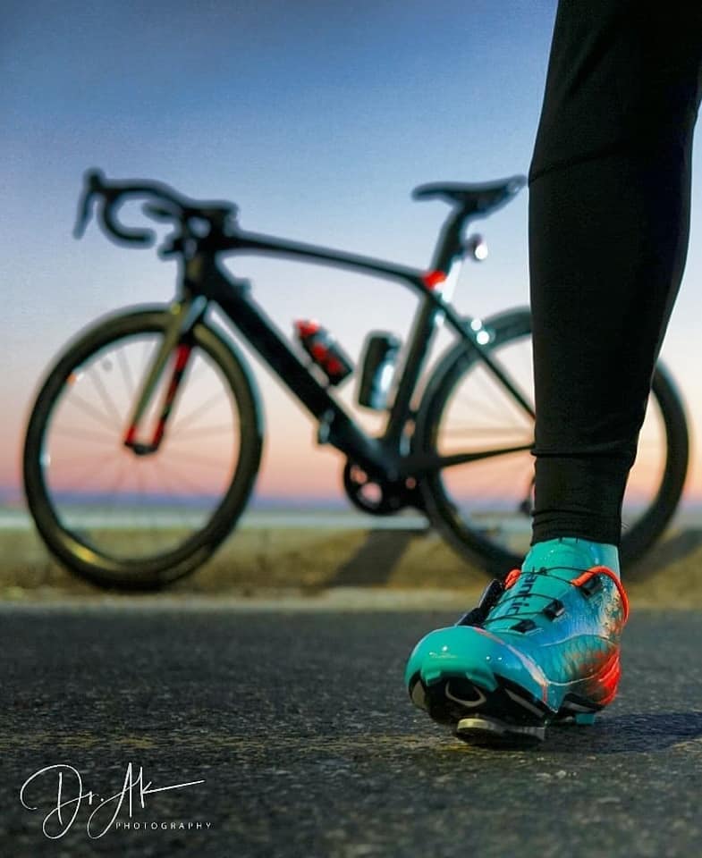 Try our Alpha road carbon shoes. The honeycomb mesh as well as nano fabric  together create a super breathing upper. While the heel part has been strengthened, which help to fixed the foot. The draining hole prevents the water at the rainy days. 