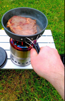 One small camping stove to cook a juicy steak! 