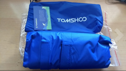 #TOMSHOO Waterproof Packable Raincoat Poncho Outdoor Camping Tent Mat comes inside a bag that you can use to store it and transport it comfortably.