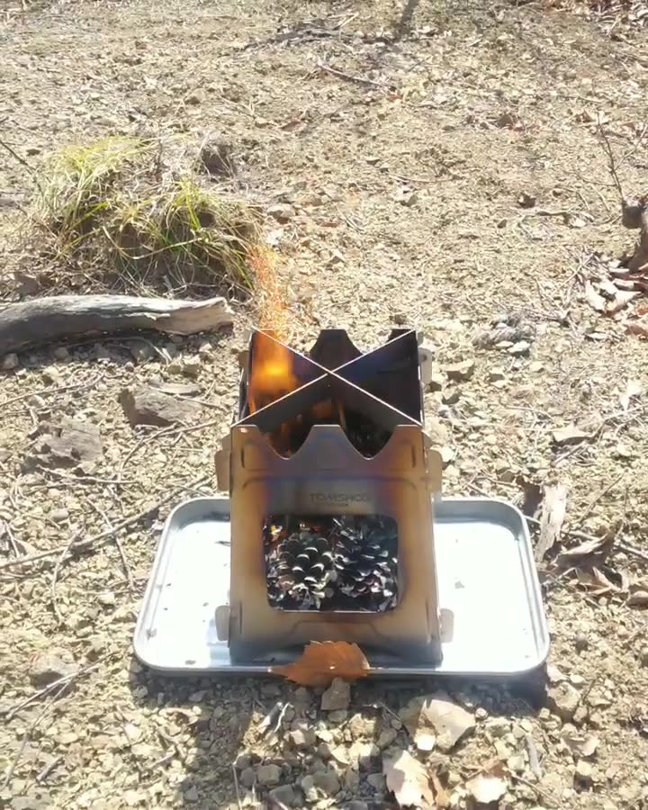 Some pine cone + #TOMSHOO Portable Folding Lightweight Camping Wood Stove = a good camping helper~