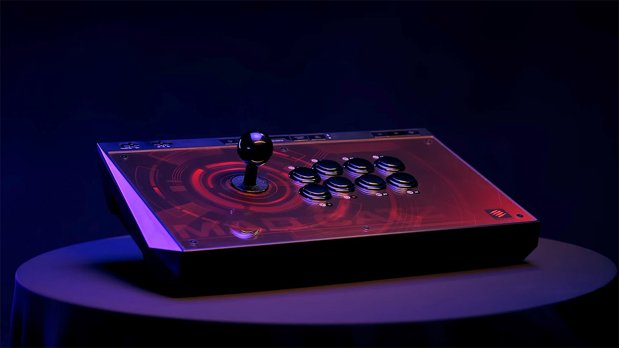 Bring the arcade to you with the Mad Catz Authentic EGO Arcade Stick. With tournament-grade components, multiple buttons and switches and PC/console compatibility, this fight stick combines the classic arcade feel with modern performance. #MadCatz