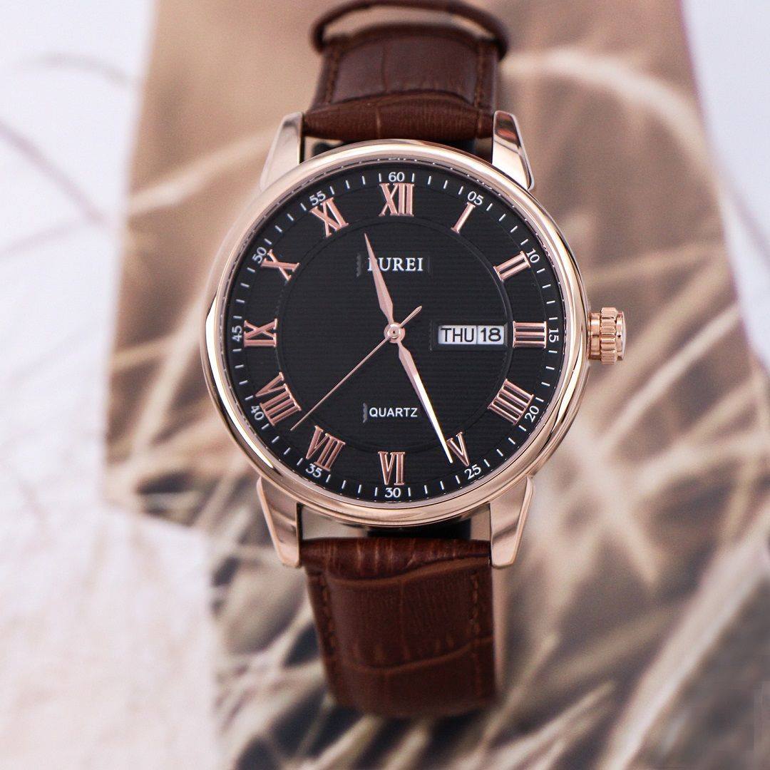 A dark attire finished up your classic look with brown band watch is 