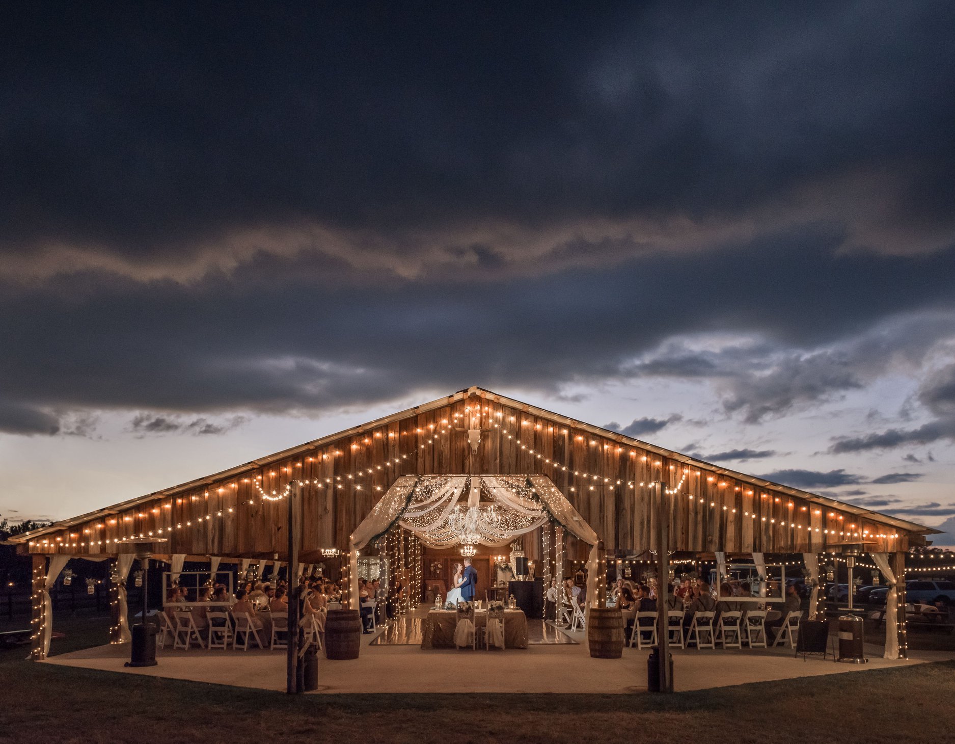 “During this particular wedding, big storm clouds started forming as we were wrapping up portraits. The clouds had my heart and I wanted to keep shooting with them. 