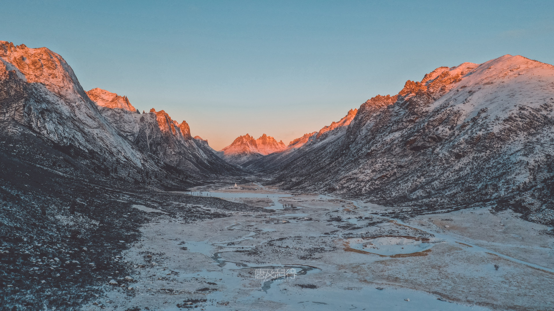 Take advantage of alpenglow lighting to get a different look to your mountain shots!  #Mavic2Pro