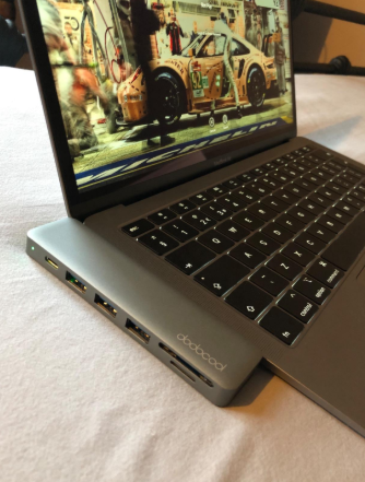 #Dodocool Aluminum Alloy 7-in-1 USB-C Hub connects to the MacBook via both USB-C ports on either side of the laptop for a nice solid connection but still lets you use an available port on the hub.